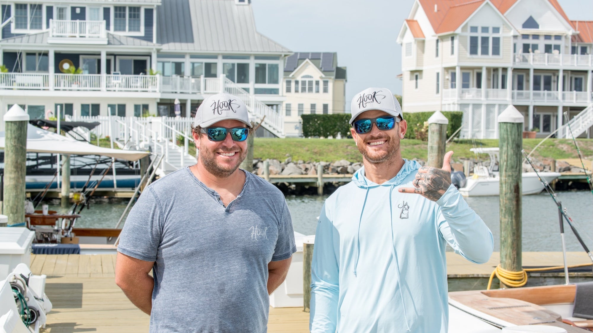 Anthony Pino and Nick Carullo standing on dock at Ocean City, MD for BackLash Radio Podcast.